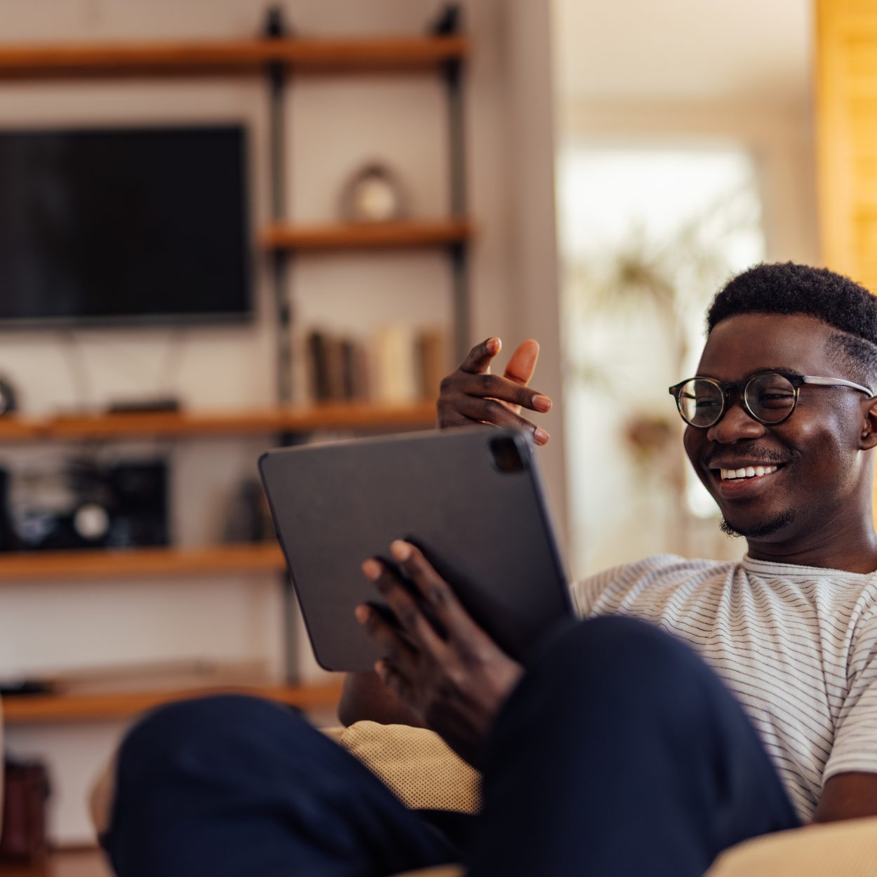 Adult man, finding his favorite book online.