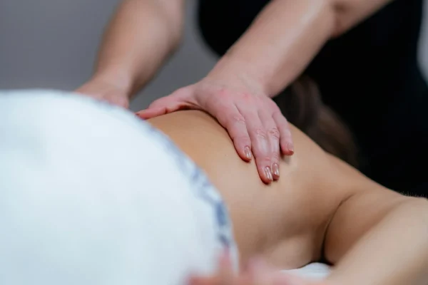 Relaxation with a traditional Lomi Lomi Hawaiian back massage at a wellness center,